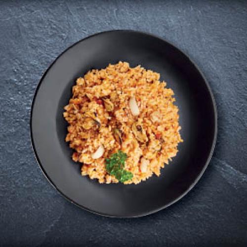 Rižota z morskimi sadeži Minute, Mercator, postrežena, cena za cca. 300 g: 3,29 EUR